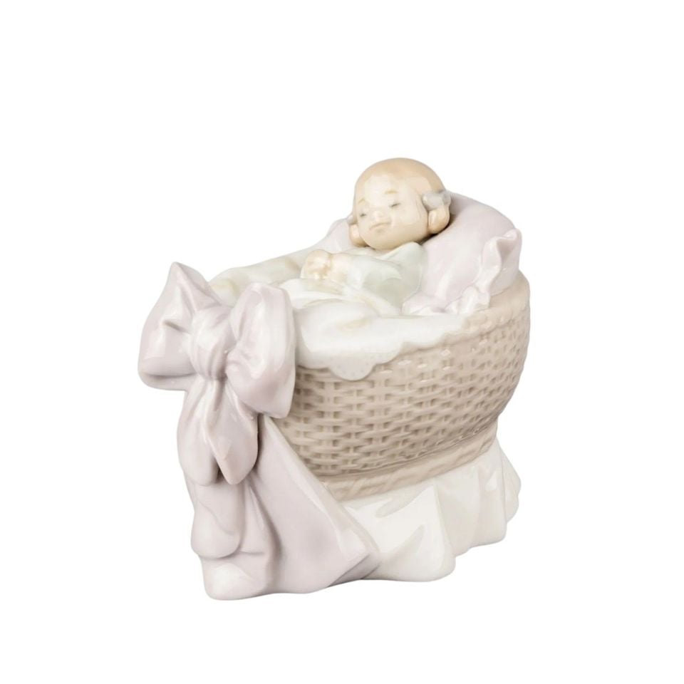 A NEW TREASURE GIRL FIGURINE