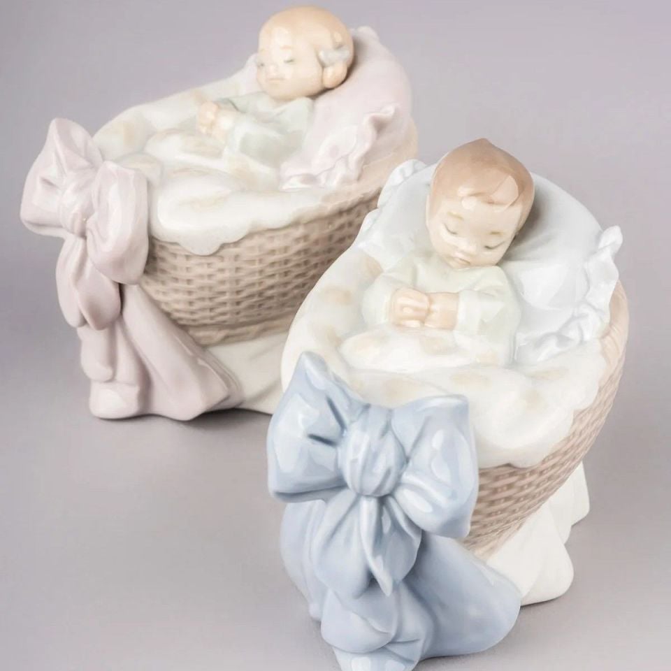 A NEW TREASURE GIRL FIGURINE