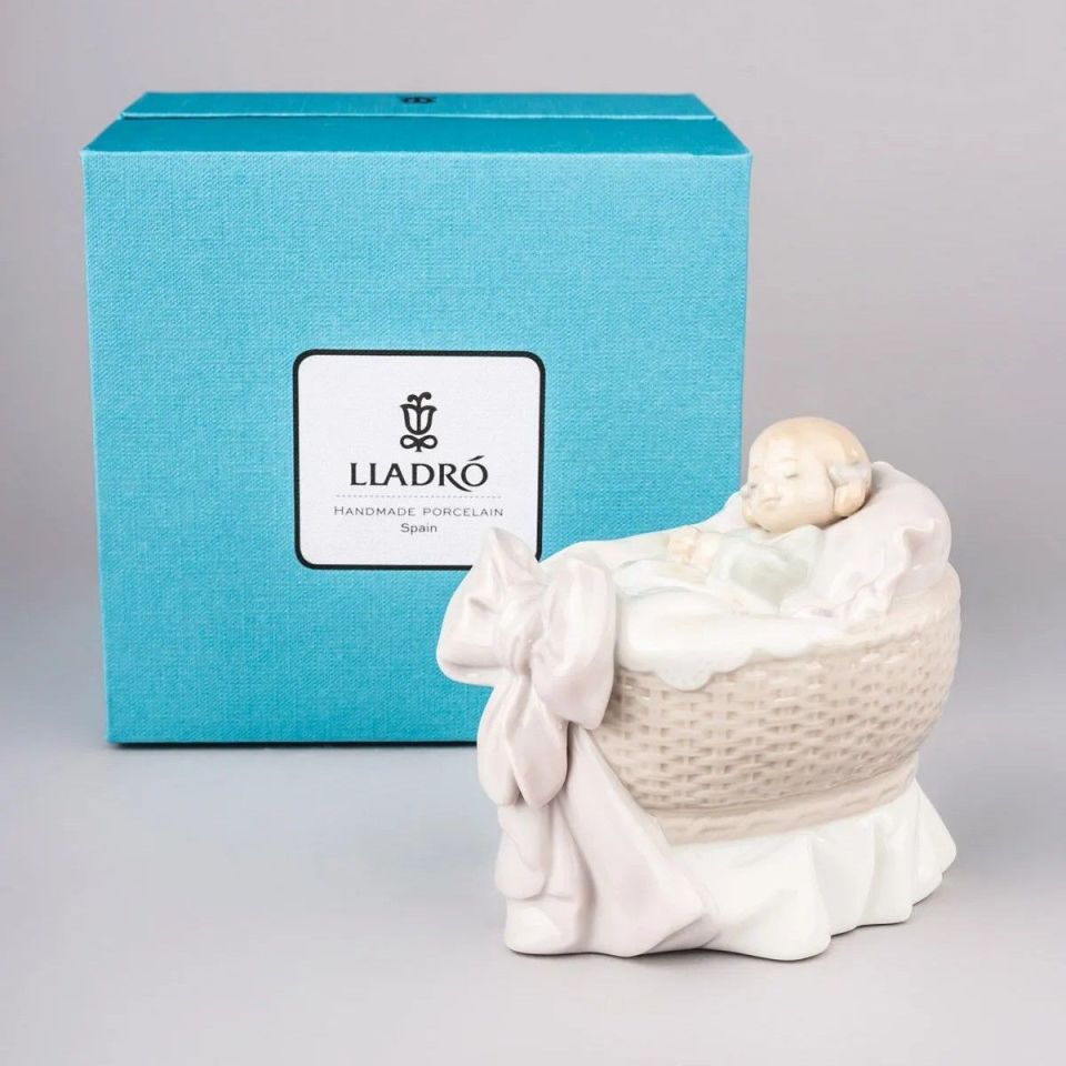 A NEW TREASURE GIRL FIGURINE