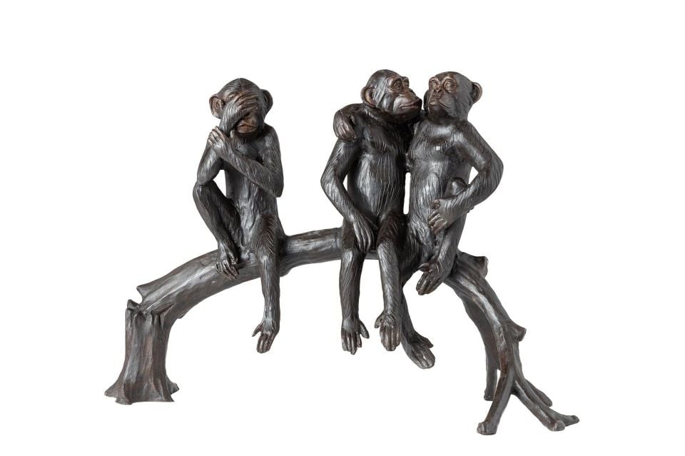 TREE MONKEYS SITTING ON A STUMP