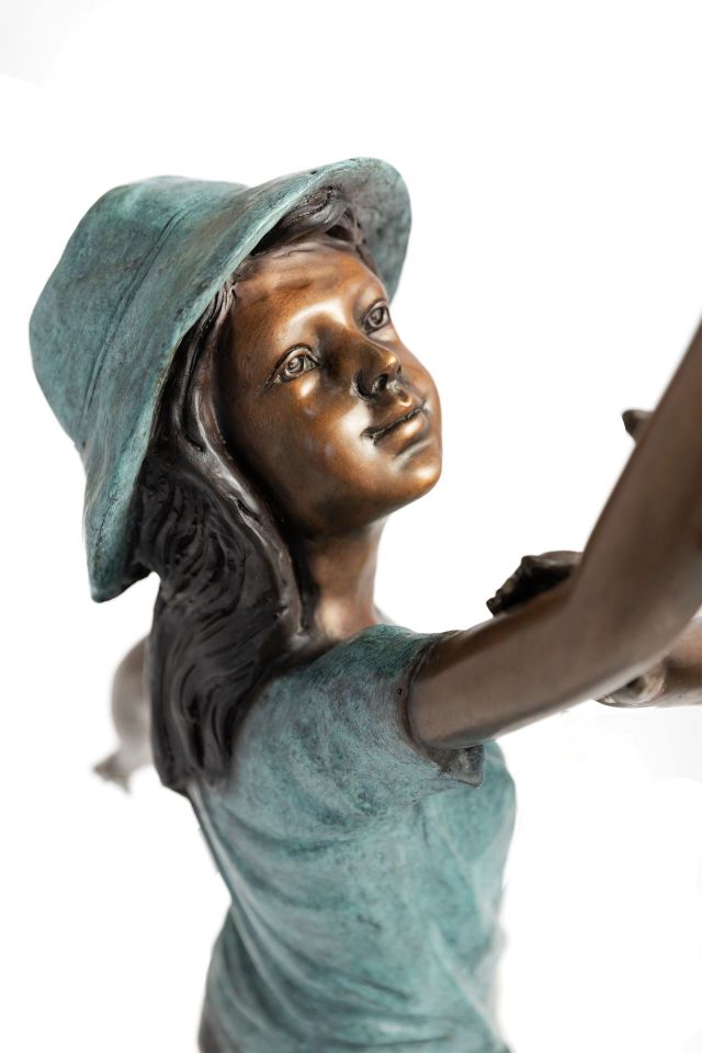 FOUNTAIN OF CHILDREN UNDER AN UMBRELLA