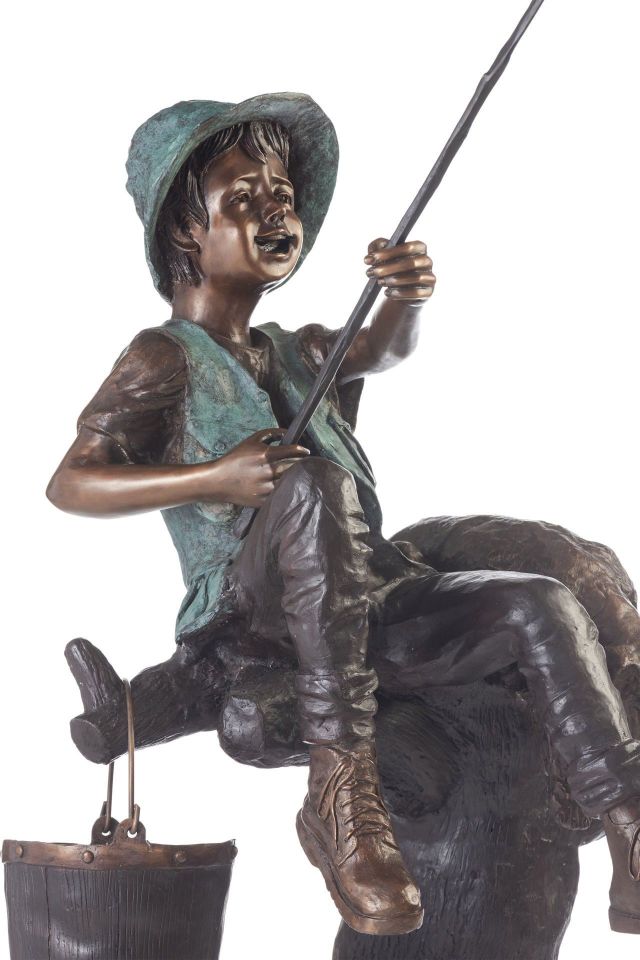 BOY HOLDING A FISH
